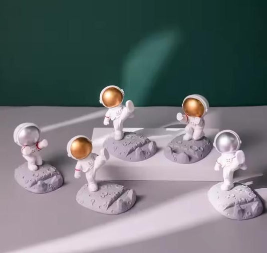 Cosmic Companion™ – The Astronaut Phone Stand That Elevates Your Space
